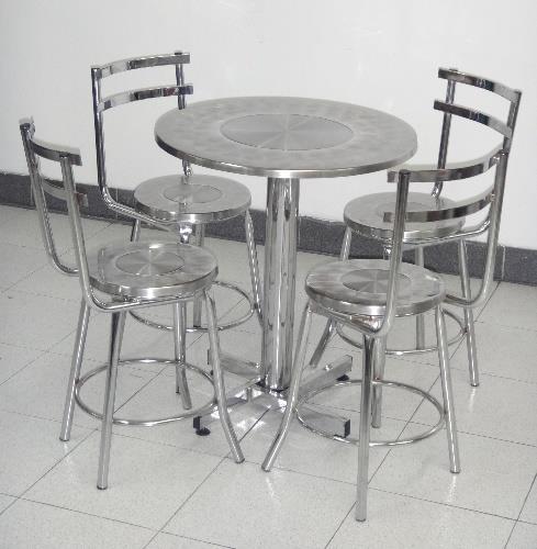 Mesas comedor en vidrio y alambre